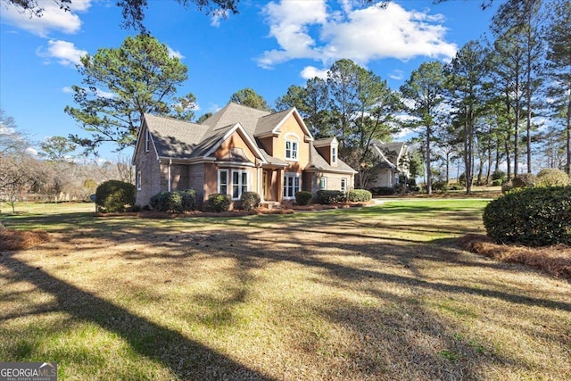 view of front facade with a front lawn