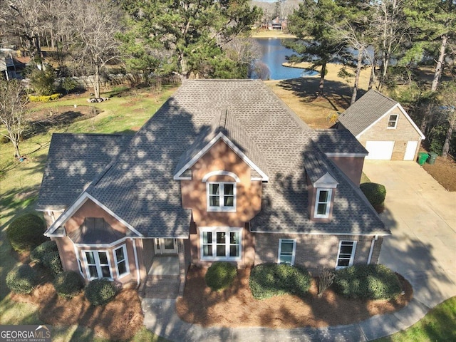 bird's eye view with a water view