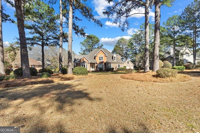 view of front of home with a front lawn