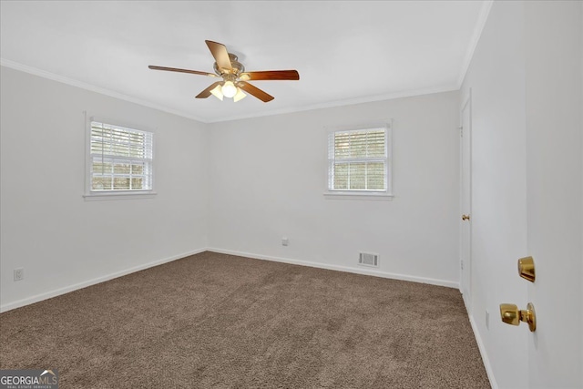 unfurnished room featuring baseboards, carpet floors, ornamental molding, and a healthy amount of sunlight