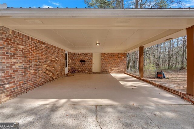 view of patio / terrace featuring an attached carport