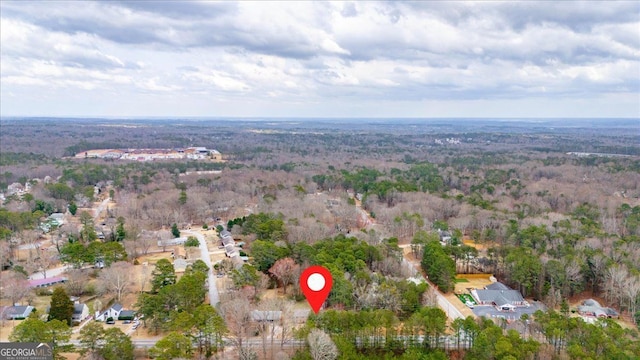 aerial view with a wooded view