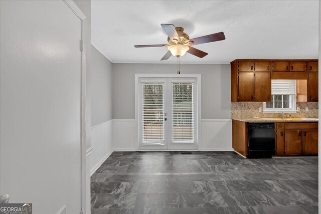 kitchen featuring black dishwasher, brown cabinets, light countertops, and french doors