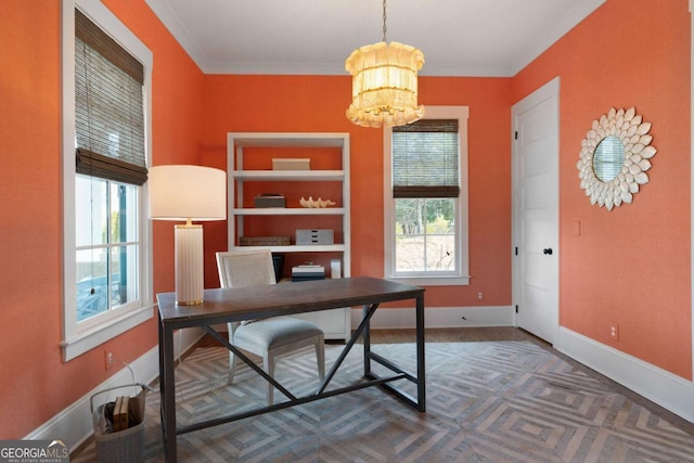 office space with a healthy amount of sunlight, baseboards, and an inviting chandelier