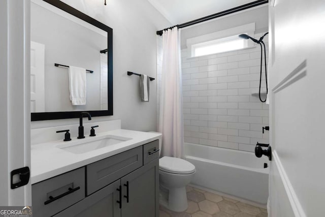 bathroom with shower / tub combo, vanity, and toilet