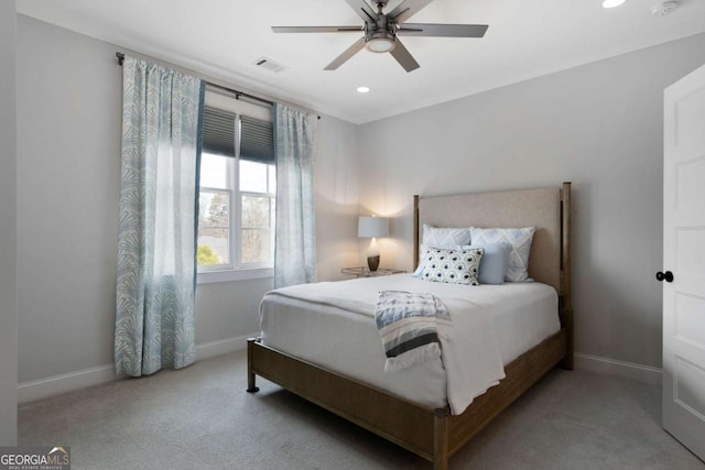 carpeted bedroom featuring ceiling fan, recessed lighting, visible vents, and baseboards