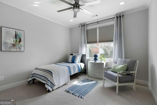 carpeted bedroom with a ceiling fan, recessed lighting, visible vents, and baseboards