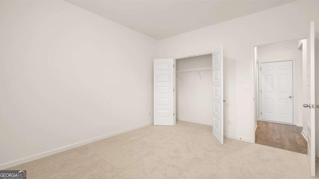 1039 Blue Juniper Cir, Loganville, GA 30052 - unfurnished bedroom with carpet and a closet