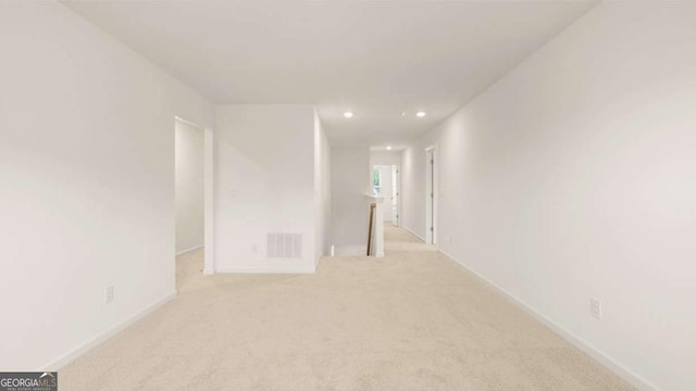 1039 Blue Juniper Cir, Loganville, GA 30052 - spare room featuring light colored carpet and recessed lighting