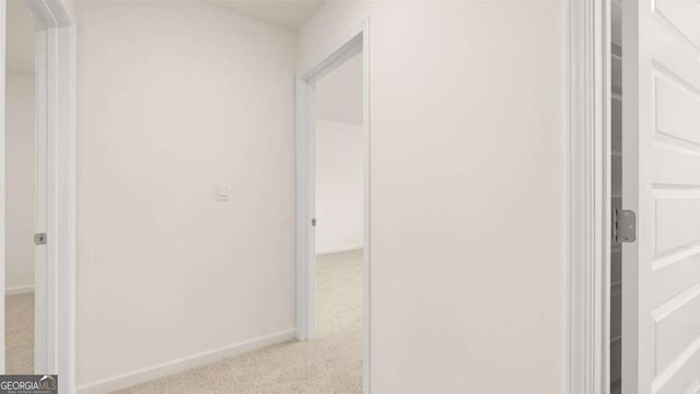 1039 Blue Juniper Cir, Loganville, GA 30052 - hall with carpet and baseboards