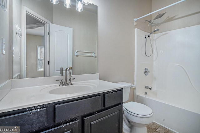 full bath featuring tub / shower combination, vanity, and toilet