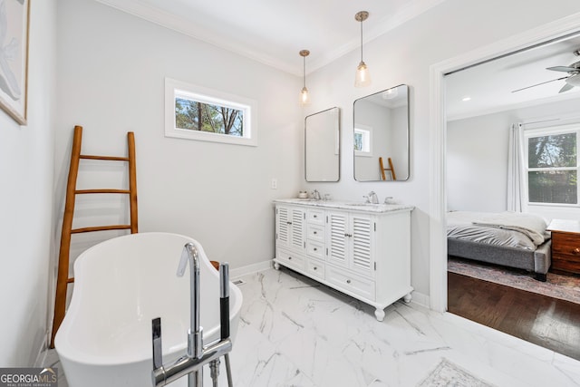 full bathroom featuring crown molding, plenty of natural light, and marble finish floor