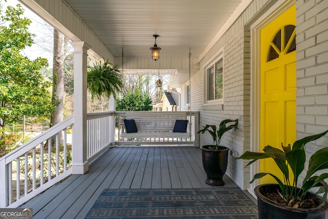 deck featuring covered porch