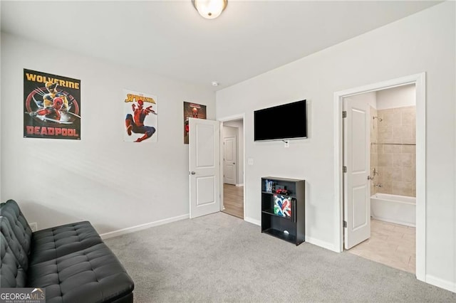 unfurnished room featuring baseboards and carpet