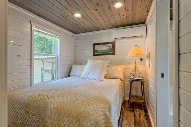 bedroom featuring wooden ceiling, a wall mounted air conditioner, wooden walls, and wood finished floors