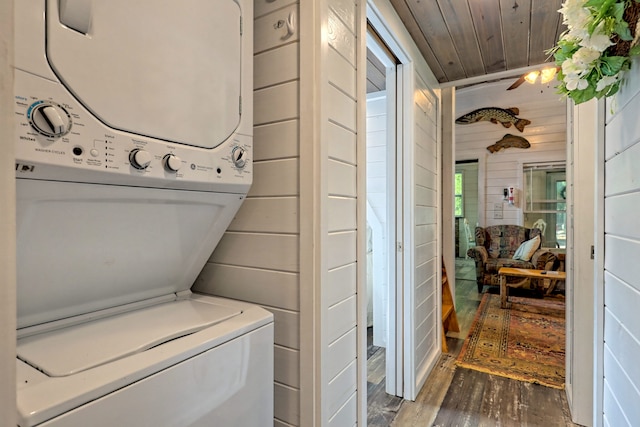 4960 Laurel Ldg, Lot Clarkesville, GA 30523 - laundry room with stacked washing machine and dryer, wood finished floors, ceiling fan, wooden walls, and wood ceiling