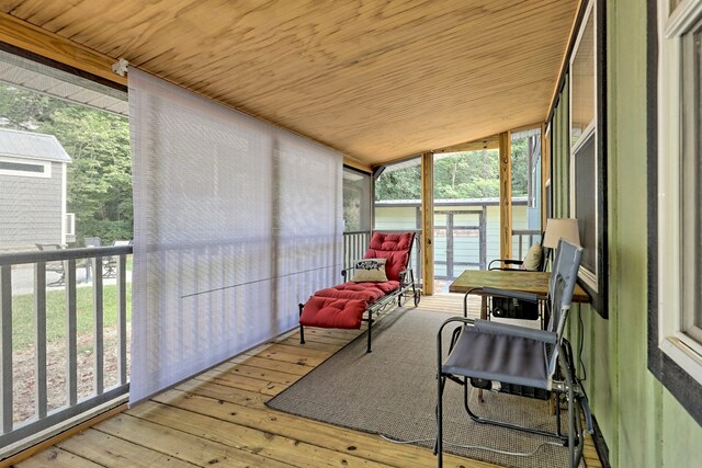 4960 Laurel Ldg, Lot Clarkesville, GA 30523 - sunroom with healthy amount of natural light and vaulted ceiling