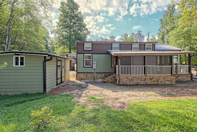 4960 Laurel Ldg, Lot Clarkesville, GA 30523 - rear view of house with a yard, a metal roof, and a sunroom