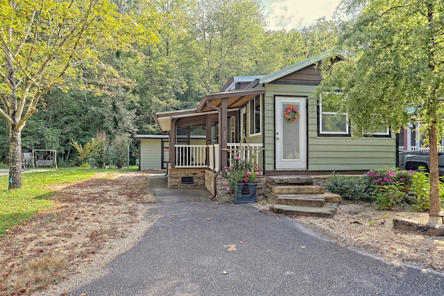 view of front of house featuring covered porch