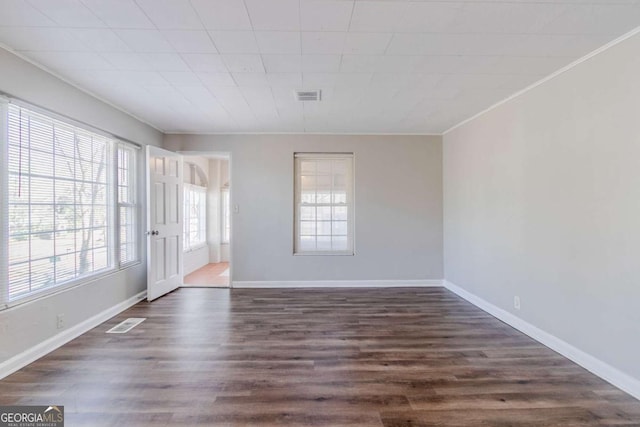 238 Howell Dr SW, Atlanta, GA 30331 - spare room featuring crown molding and dark wood-style floors