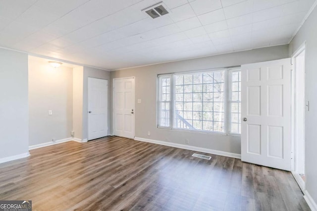 238 Howell Dr SW, Atlanta, GA 30331 - unfurnished bedroom featuring wood finished floors and baseboards
