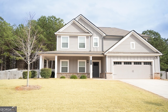 view of front of house with concrete driveway, brick siding, and board and batten siding