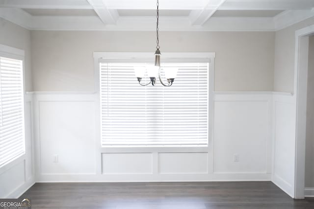 unfurnished dining area with a chandelier, dark wood-style flooring, and beamed ceiling