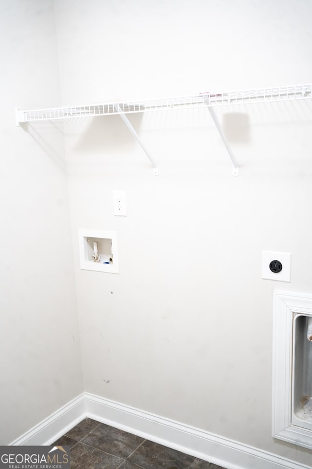 laundry area featuring laundry area, baseboards, washer hookup, and electric dryer hookup