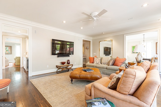 living area featuring dark wood-style floors, recessed lighting, crown molding, and baseboards