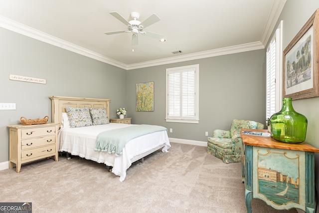 bedroom featuring visible vents, crown molding, baseboards, and carpet floors