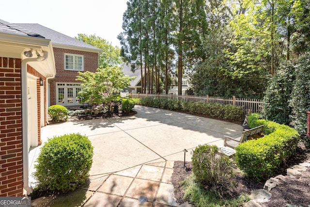 view of patio / terrace featuring fence