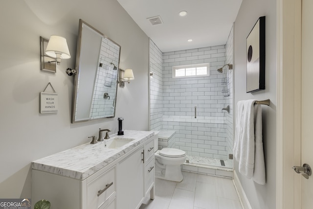 full bathroom with visible vents, toilet, vanity, a shower stall, and recessed lighting