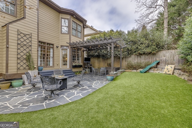 view of patio / terrace with entry steps, fence, and a pergola