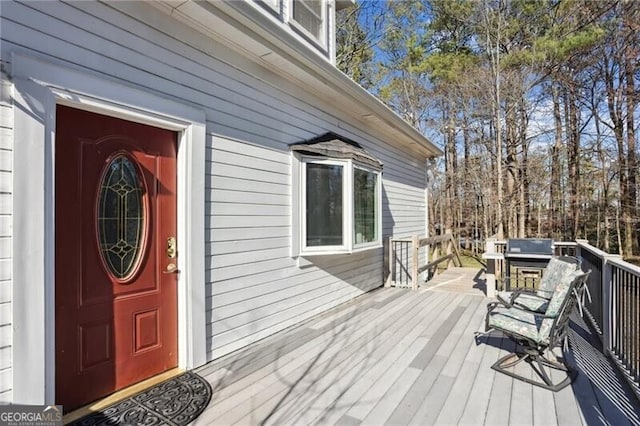 doorway to property with a deck