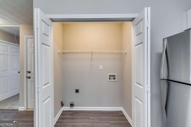 2139 Hickory Bnd SE Unit E, Conyers, GA 30013 - laundry room with hookup for an electric dryer, hookup for a washing machine, and dark wood-type flooring