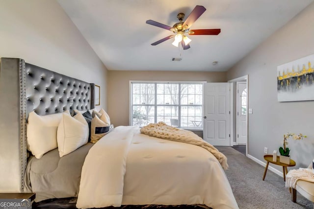 2139 Hickory Bnd SE Unit E, Conyers, GA 30013 - bedroom featuring lofted ceiling, multiple windows, carpet, and a ceiling fan