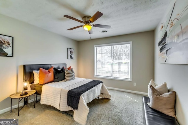 2139 Hickory Bnd SE Unit E, Conyers, GA 30013 - bedroom featuring carpet floors and a ceiling fan