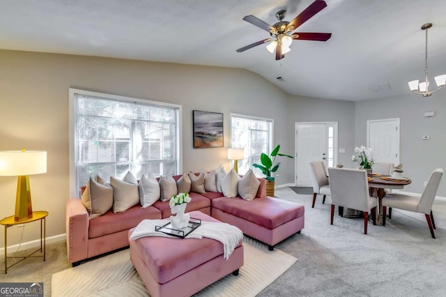 2139 Hickory Bnd SE Unit E, Conyers, GA 30013 - living area with lofted ceiling, light colored carpet, a chandelier, and ceiling fan