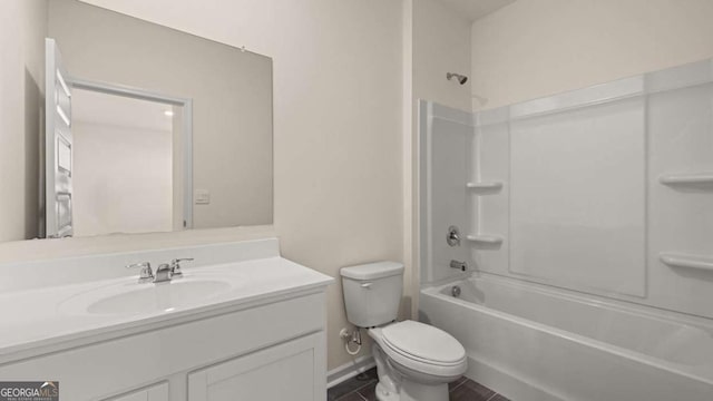 1069 Blue Juniper Cir, Loganville, GA 30052 - full bathroom with toilet, baseboards,  shower combination, and vanity