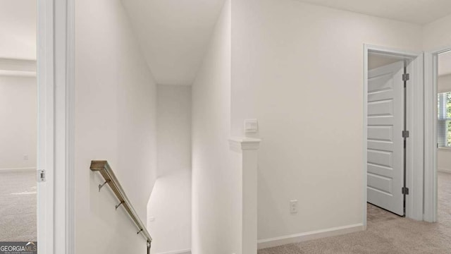 1069 Blue Juniper Cir, Loganville, GA 30052 - stairway featuring carpet and baseboards