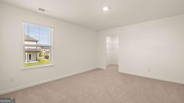 1069 Blue Juniper Cir, Loganville, GA 30052 - carpeted empty room featuring visible vents and baseboards