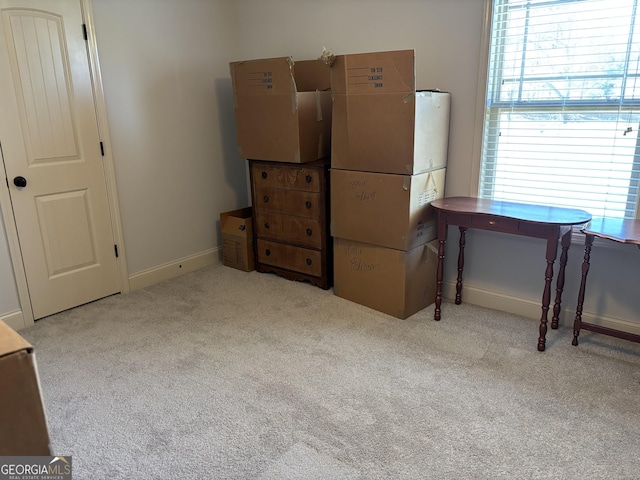 carpeted bedroom with baseboards