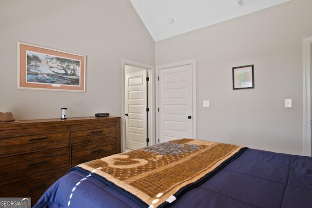 bedroom featuring lofted ceiling