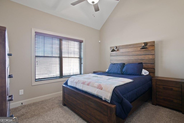 bedroom featuring lofted ceiling, baseboards, carpet floors, and ceiling fan