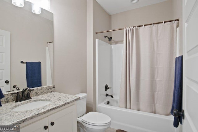 full bathroom with shower / bath combination with curtain, vanity, and toilet