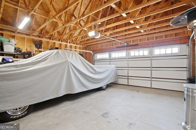 garage featuring a garage door opener