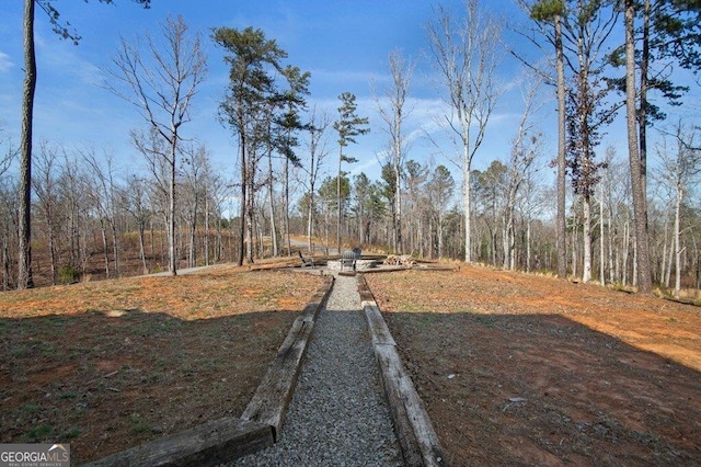 view of street with a forest view