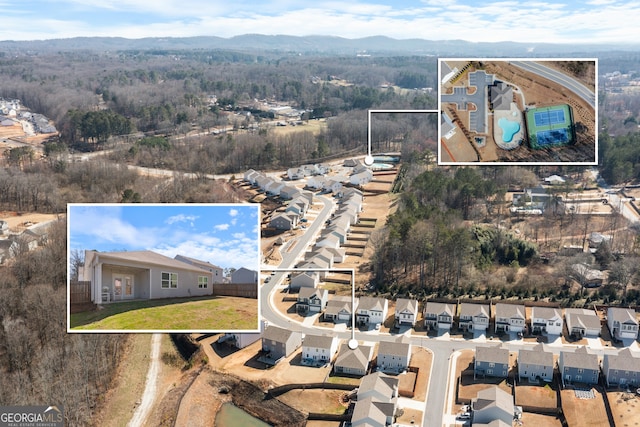 bird's eye view featuring a residential view and a mountain view