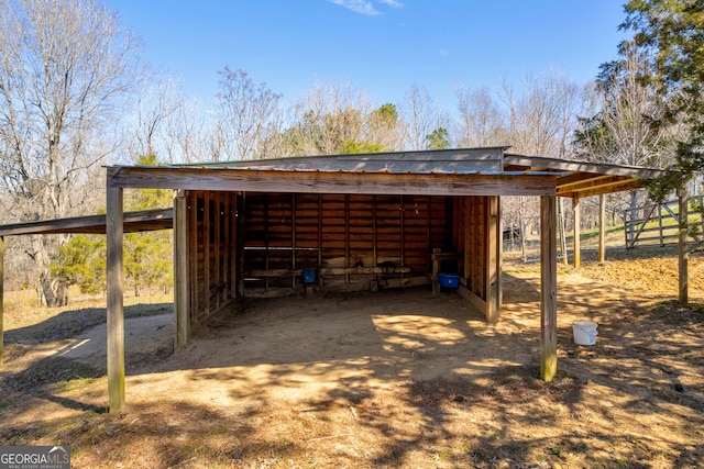 view of outbuilding featuring an outbuilding and driveway