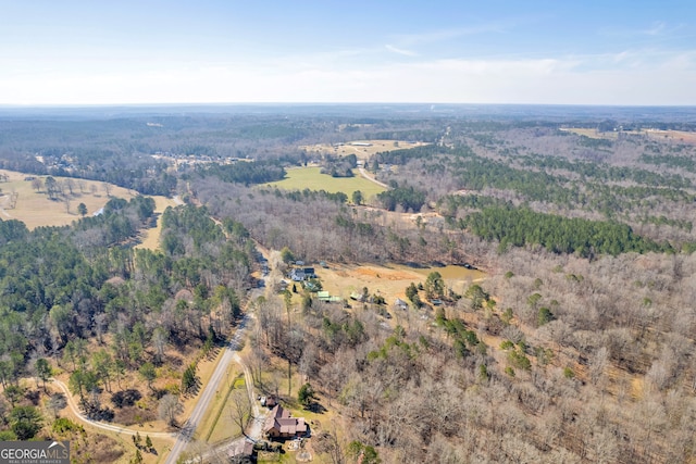 bird's eye view featuring a view of trees